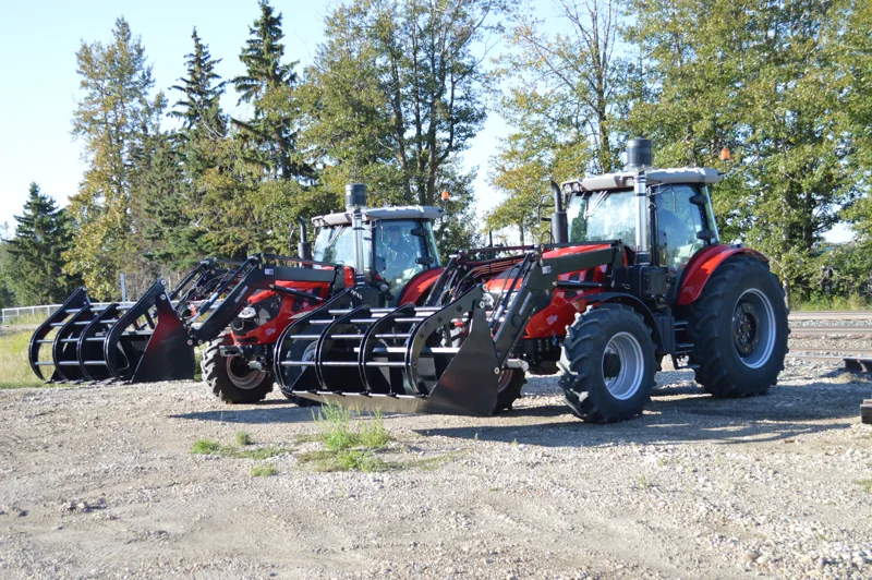 URSA tractors displayed together outdoors